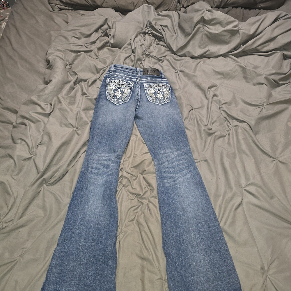 Sky Blue Flare Jeans with Embellished Pockets